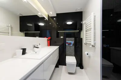 a white bathroom with a sink and a toilet at Cozy and Large 62 m2 Apartment with Air Conditioning, Old Town in Kraków