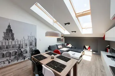 a living room with a couch and a table at Cozy and Large 62 m2 Apartment with Air Conditioning, Old Town in Kraków
