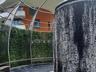 a water fountain in front of a building at Apartament N89 Wiślane Tarasy in Kraków