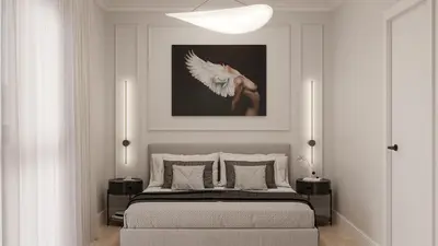 a white bedroom with a bed with a white bird on it at Pearl of the city in Kraków