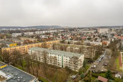 an aerial view of a city with buildings and cars at Prądnik Biały Apt - Parks Nearby - by Rentujemy in Kraków