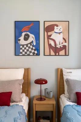 a living room with a table and a kitchen at Red Roof Apartments Old Town in Kraków