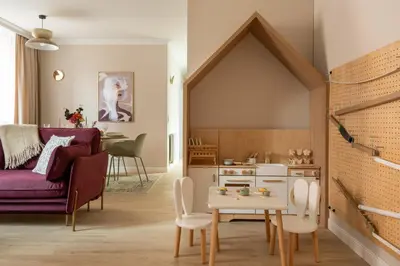 a kitchen with white cabinets and a counter at Red Roof Apartments Old Town in Kraków