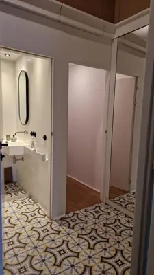 a bathroom with a sink and a mirror at Noce i Dnie in Kraków