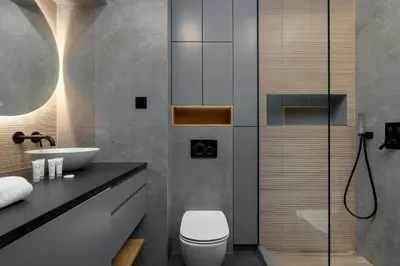 a bathroom with a toilet and a sink and a shower at Lubicz Stylish Apartment with Parking and Air Conditioning in the City Center by Noclegi Renters in Kraków