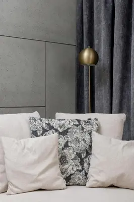 a bed with white pillows and a gold lamp at Lubicz Stylish Apartment with Parking and Air Conditioning in the City Center by Noclegi Renters in Kraków