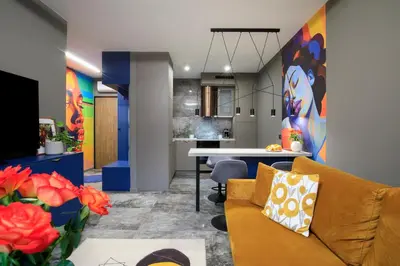 a living room with a couch and a table at Soho Residence in Kraków