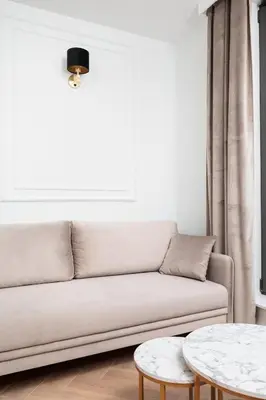 a living room with a couch and two tables at City of the Kings - Riverside K22 m44 in Kraków