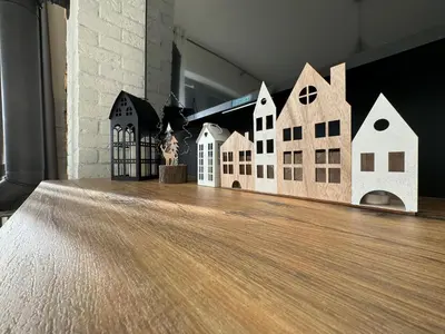 a group of model houses on a wooden floor at Zaczarowane Wzgórze - Domek w Beskidach in Czaniec