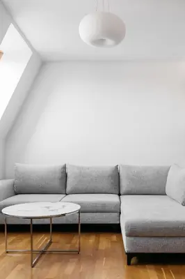 a living room with a couch and a table at Native Apartments Kraszewskiego 26 in Kraków