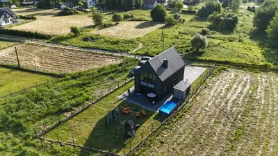 an aerial view of a small house on the tracks at Stodoła pod Bacówką Zawoja Sauna Jacuzzi in Skawica