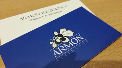 a visa card with a flower on it at Armon Residence in Kraków