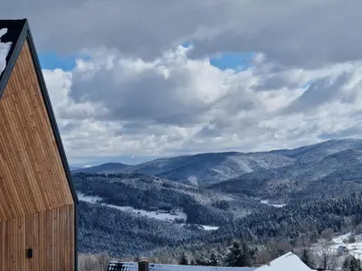 a view of the mountains from a house at CzarnyHetman in Grzechynia