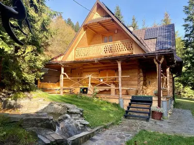 a log cabin in the snow at CypiSówka in Nowy Targ