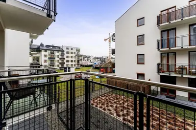 a view from the balcony of an apartment building at Apartments Deluxe Barcelona 55 by BookingHost in Kraków