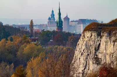 a view of a city with a castle in the background at Yesblisko in Kraków