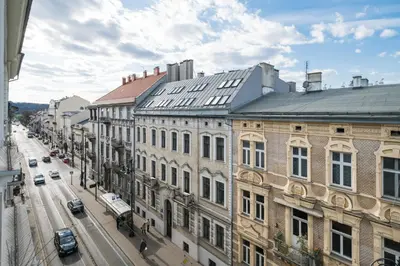 a view of a city street with buildings and cars at Horizon Apartments - Dom Sapiehy in Kraków