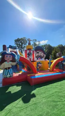 a inflatable train ride at an amusement park at Hotel Karpik Zator Graboszyce in Graboszyce