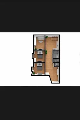 a floor plan of a small apartment with a kitchen at Beer Street Apartment in Kraków