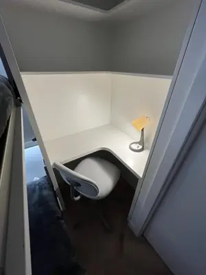a small room with a chair and a lamp at Nenufar Cracow Garden Kraków Parter Free Darmowy Parking Ogród Netflix Klimatyzacja in Kraków