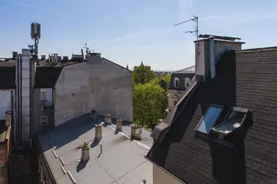 an overhead view of a rooftop of a building at Charming Rustic Old Town Apartment in Kraków