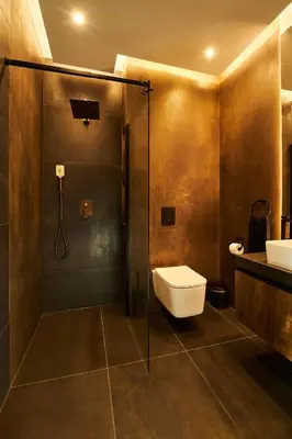 a bathroom with a shower and a toilet and a sink at Place Oswiecim - underground parking, air conditioning, Self Check In in Oświęcim