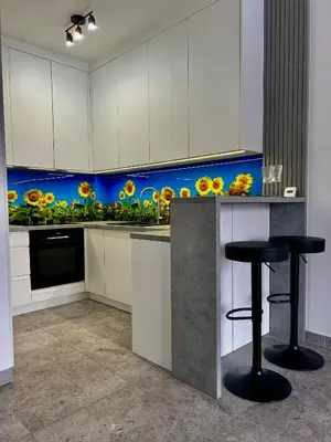 a living room with a couch and a large window at Place Oswiecim - underground parking, air conditioning, Self Check In in Oświęcim