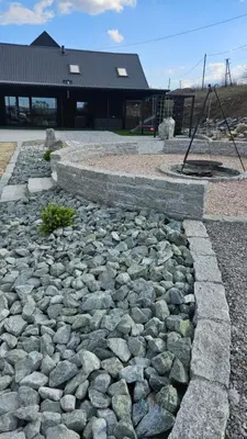 a stone walkway in front of a building at Secret Barn in Michalczowa