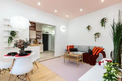 a living room with a couch and a table at Apartment near Main Station - Bosacka 8 street in Kraków