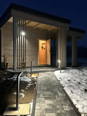 a walkway leading to a building with a door at Piekielne zacisze in Klecza Dolna