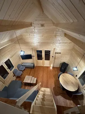 an overhead view of a room with a table and chairs at Piekielne zacisze in Klecza Dolna