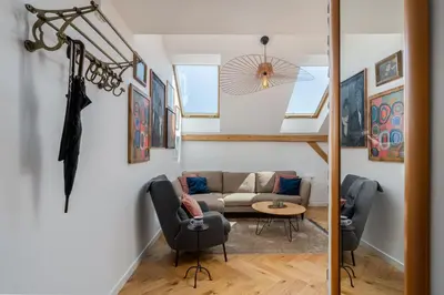 a living room with a couch and a table at Luxury apartment in a truly PERFECT location in Kraków