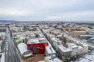 an aerial view of a city with snow covered buildings at Kraków Grzegórzki Studio - Central Station Nearby - by Rentujemy in Kraków