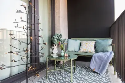 a living room with a couch and a table at Apartment Blue near Schindler in Kraków