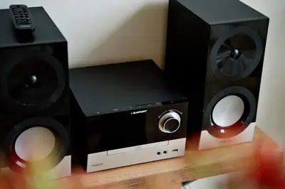 a trio of speakers and a subwoofer at Apartamenty Galicja Zator in Zator