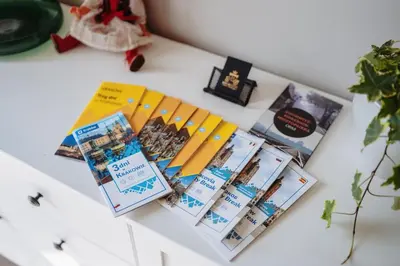 a table with books and pamphlets on it at Basztowa 5a in Kraków