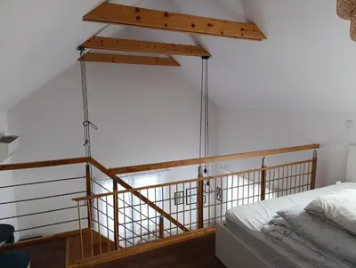 a room with a bed with at Bukszpanowa Alejka domek całoroczny, okolica Ojcowski Park Narodowy in Milonki