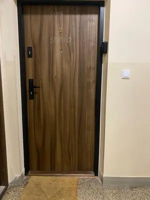 a wooden door with a sign on it at Krakow Center - Chill Spot by the River in Kraków