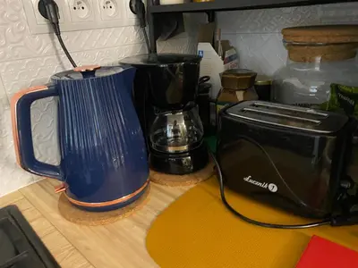 a kitchen counter with a blender and a toaster at Krakow Center - Chill Spot by the River in Kraków