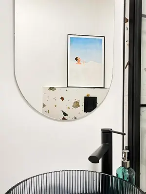 a mirror hanging on a wall above a sink at Premium Jacuzzi with Air conditioning, Main Square Cracow in Kraków