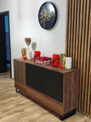 a counter with a clock on the wall and trophies at Willa Sielski Zakątek in Raba Wyżna