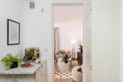 a living room with a couch and a table at Your private oasis in Cracow in Kraków