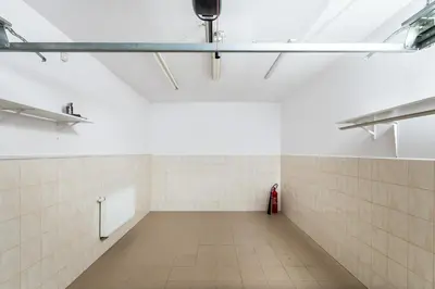a hallway with a red fire hydrant in a room at Your private oasis in Cracow in Kraków