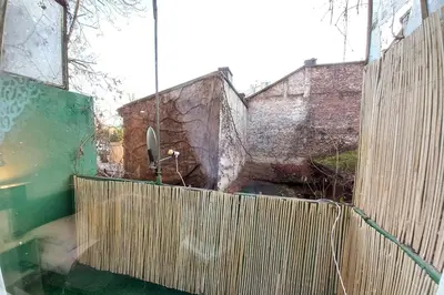 a view of a building from a window with a fence at Stary Krakow - Sołtyka S2a in Kraków