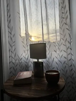 a bedroom with a bed and two windows at Dom Na Wzgórzu in Poręba