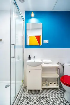 a bathroom with a shower and a sink and a toilet at ShortStayPoland Old Town C1 in Kraków