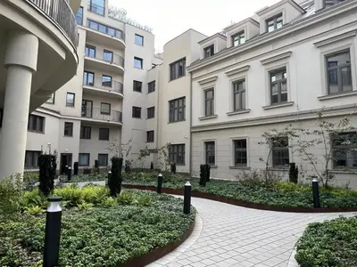 a courtyard in front of a building at Cracow Superior Apartment by BookingHost in Kraków