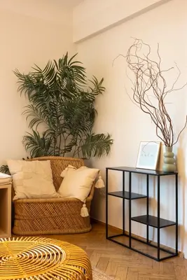 a living room with a couch and a table at Riverside Harmony in Kraków
