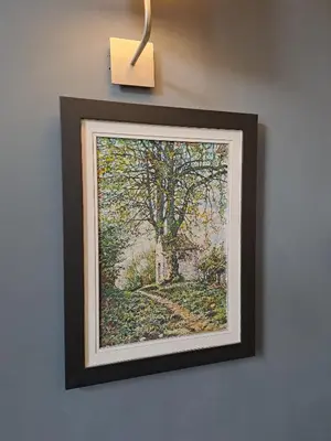 a picture of a painting of a tree at DaVinci Bello apartment in Kraków