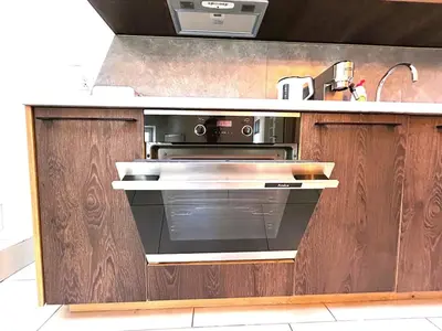 a kitchen with a stove and a sink at Old Town Apt -Bosacka 2 bedrooms B43 in Kraków